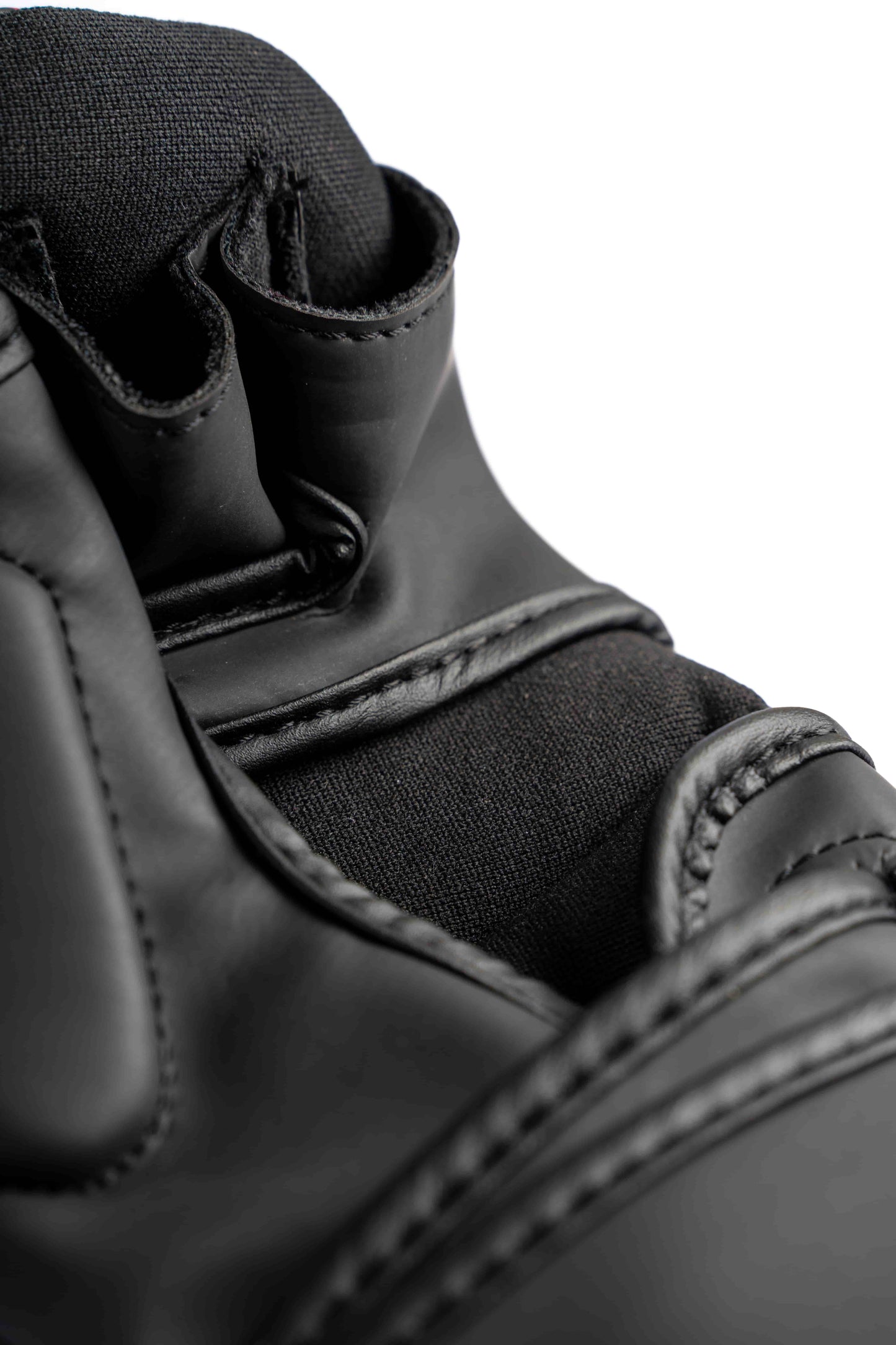 Inside padding and stitching detail of Knuckl hybrid glove