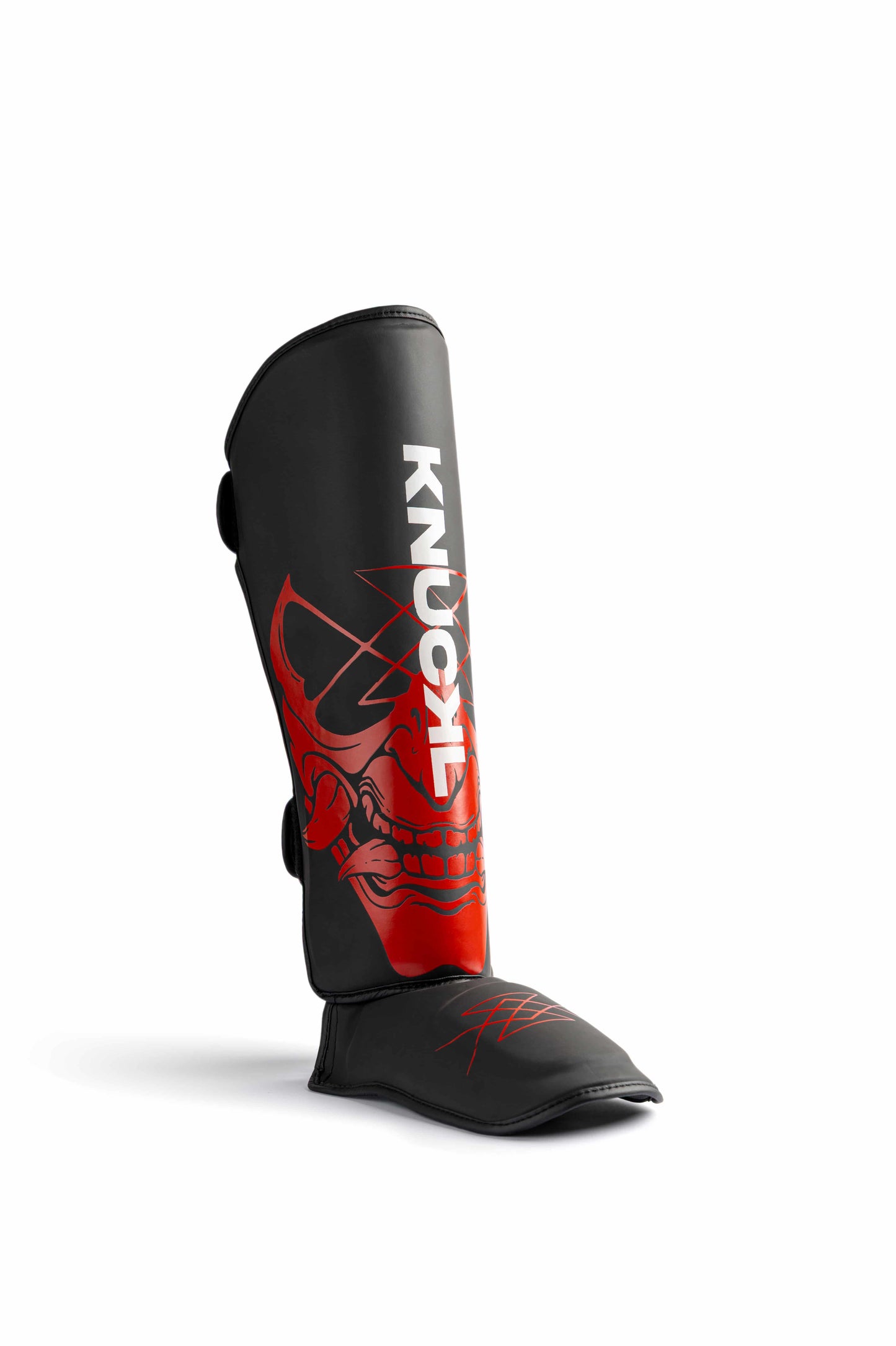 Side profile of Knuckl shin guard showing foot cover