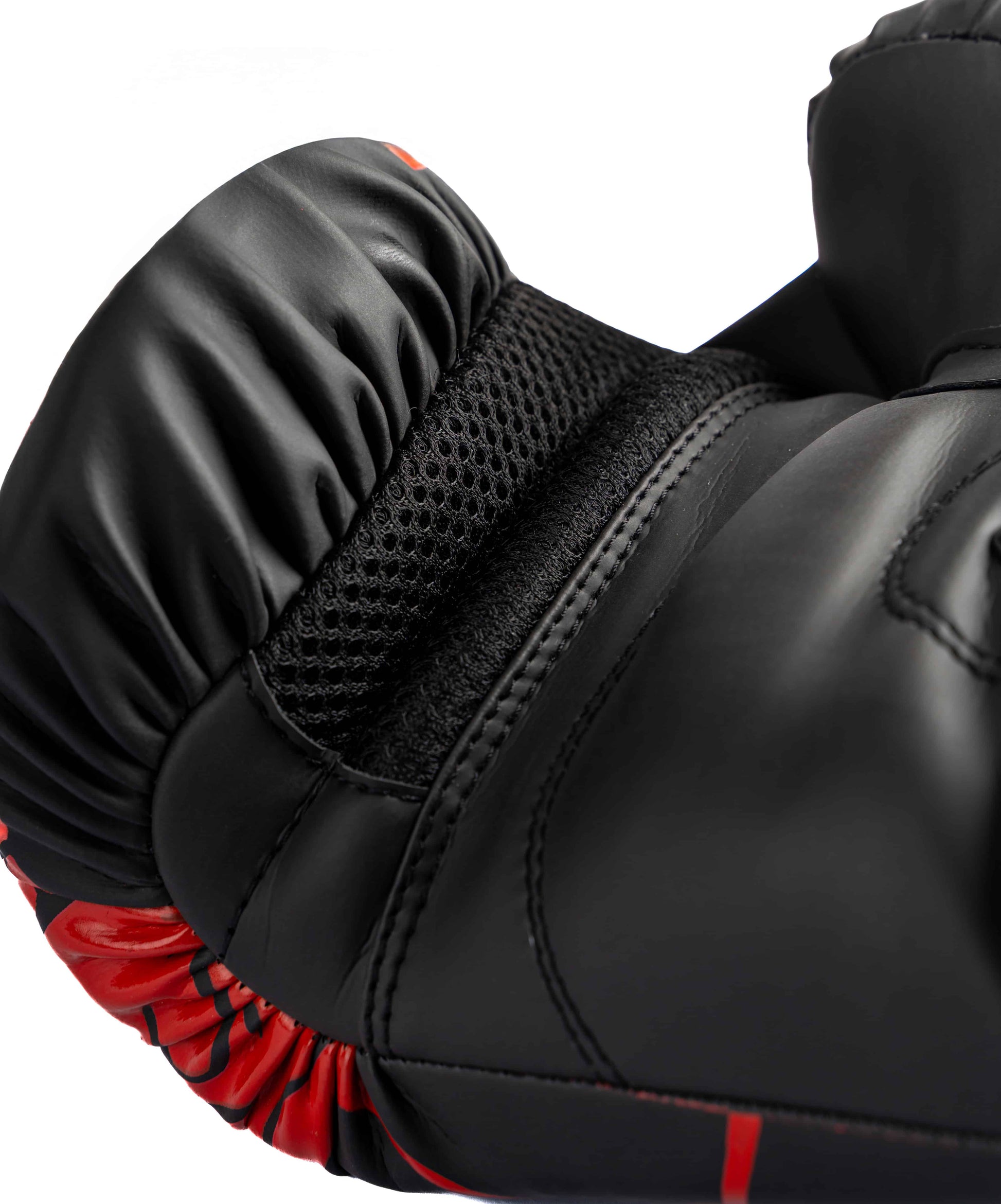 Knuckl synthetic glove showing wrist support and breathable mesh padding