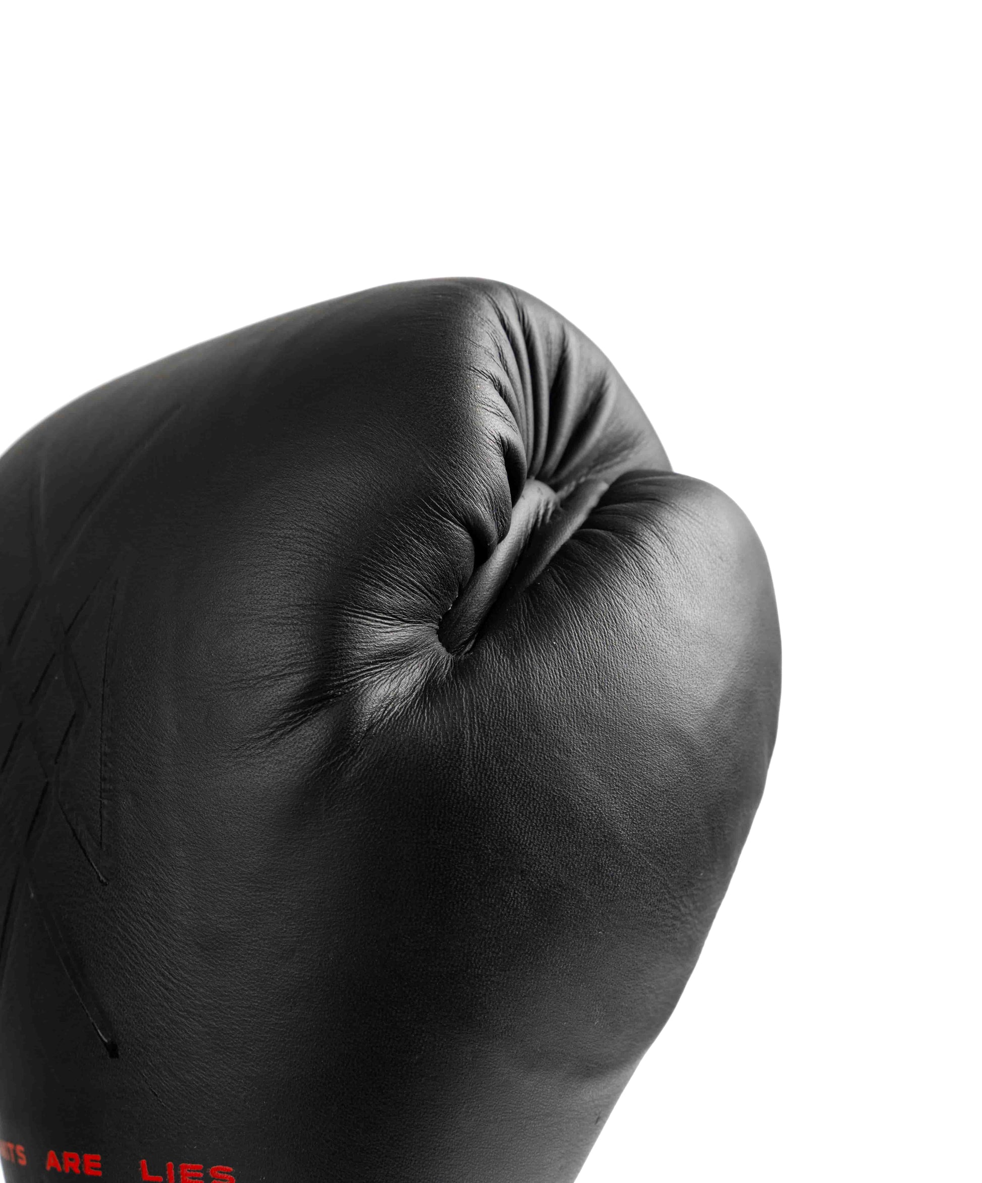 Detailed knuckle shot of ONYX glove showing texture and curvature