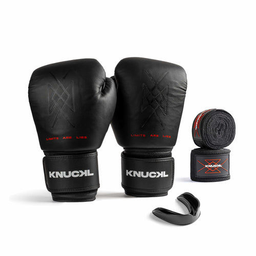 Knuckl Onyx Kit — Includes black boxing gloves, hand wraps, and mouth guard.