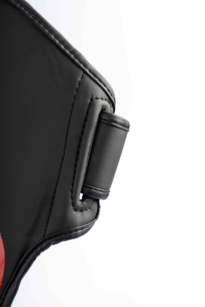 Shin guard strap detail showing secure closure system