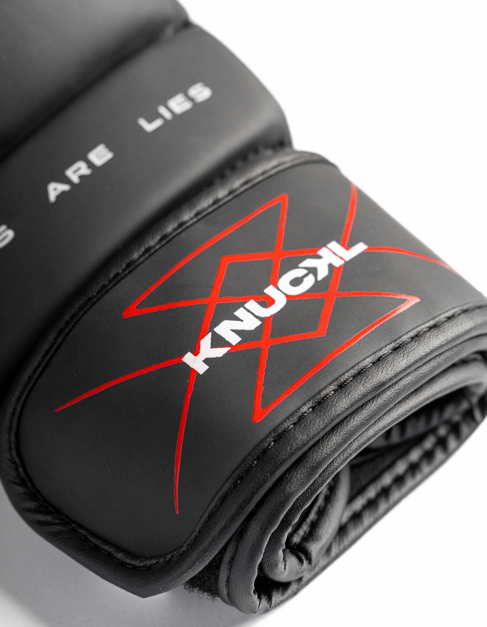 Knuckl velcro wrist strap detail on sparring glove